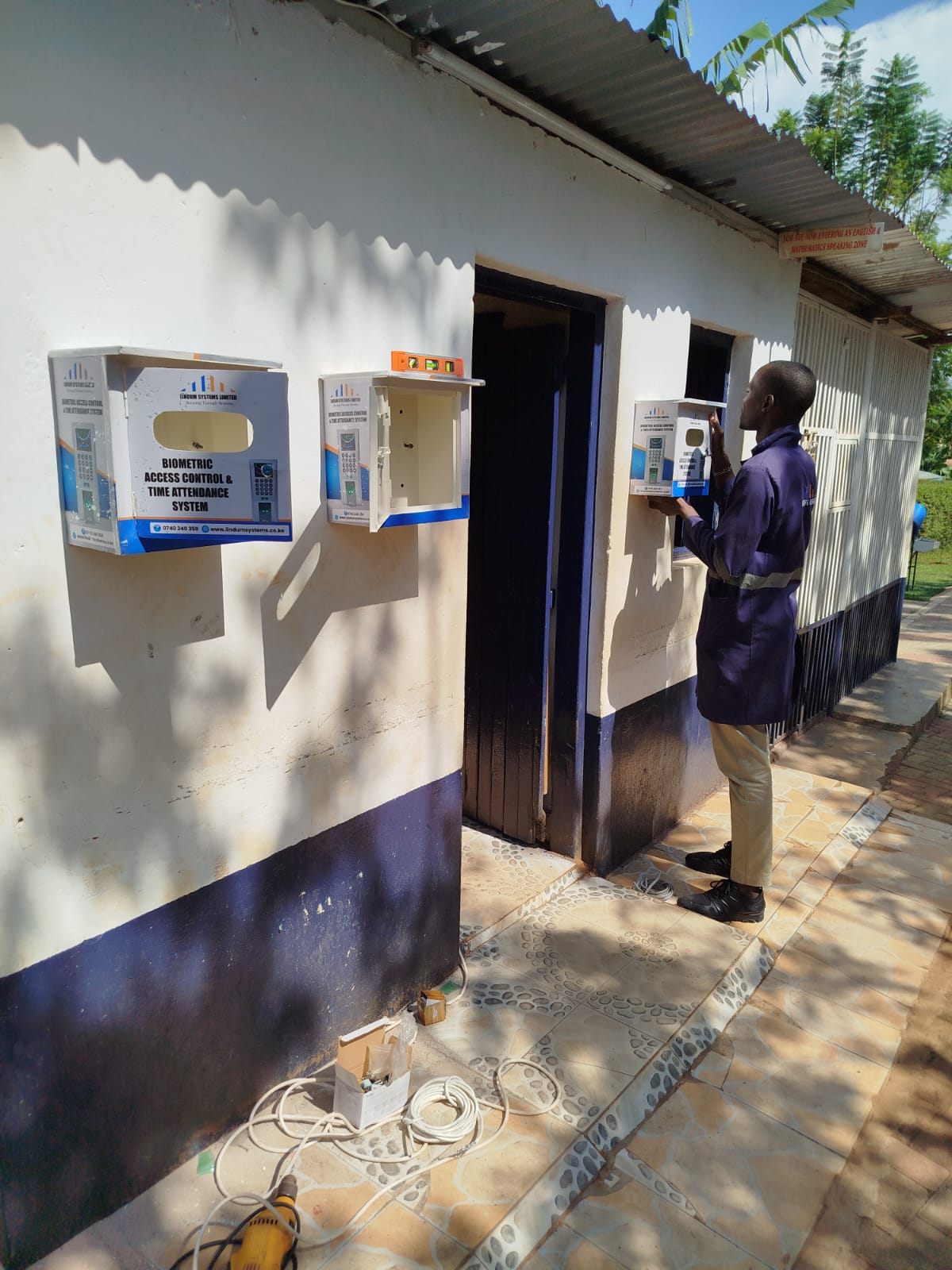 Biometric fingerprint access control system installed at a school entrance in Kenya by Lindum Systems